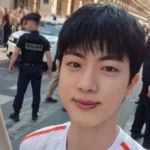 BTS member Jin made history at the 2024 Paris Olympics by carrying the torch within the Louvre Museum on Bastille Day. His interview was conducted in Korean, highlighting Korea's growing global influence.