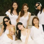 Girls' Generation recently celebrated their 17th anniversary, sharing group photos where Sunny's image was photoshopped due to her being in the United States for a schedule. The members, despite being under different agencies, continue to show strong group cohesion.