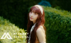 FIFTY FIFTY released the first 'SOS' teaser, showcasing stunning visuals in a fairy-tale-like setting. The teaser introduces each member and highlights their style as they gather in a maze, increasing curiosity. Anticipation for the second teaser and LOVE TUNE album grows as fans eagerly await the release.