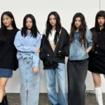 NewJeans is struggling emotionally after the forced removal of Min Heejin from ADOR. The members, especially Daniel and Minji, have expressed difficulty adjusting to the sudden change in leadership.