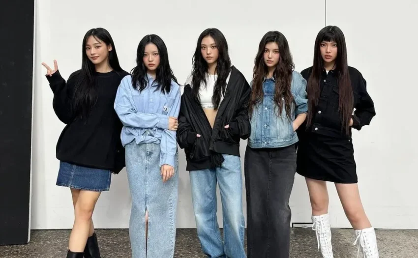 NewJeans is struggling emotionally after the forced removal of Min Heejin from ADOR. The members, especially Daniel and Minji, have expressed difficulty adjusting to the sudden change in leadership.