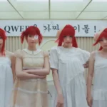 The energetic return of QWER with "Fake Idol" showcases their unique sound and bold lyrics, addressing critics who label them as "fake idols." The single merges lively band music with witty vocals, emphasizing QWER’s energetic spirit and authenticity.